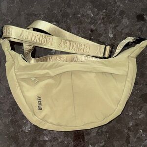 Brixley Basil Green Crescent Crossbody Bag